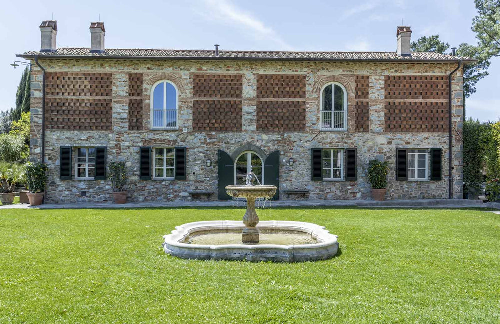 Fountain in front of a house